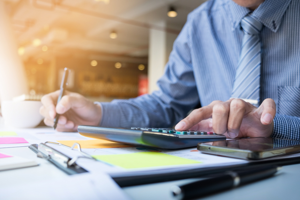 /upl/business-finance-man-calculating-budget-numbers-invoices-financial-adviser-working.jpg