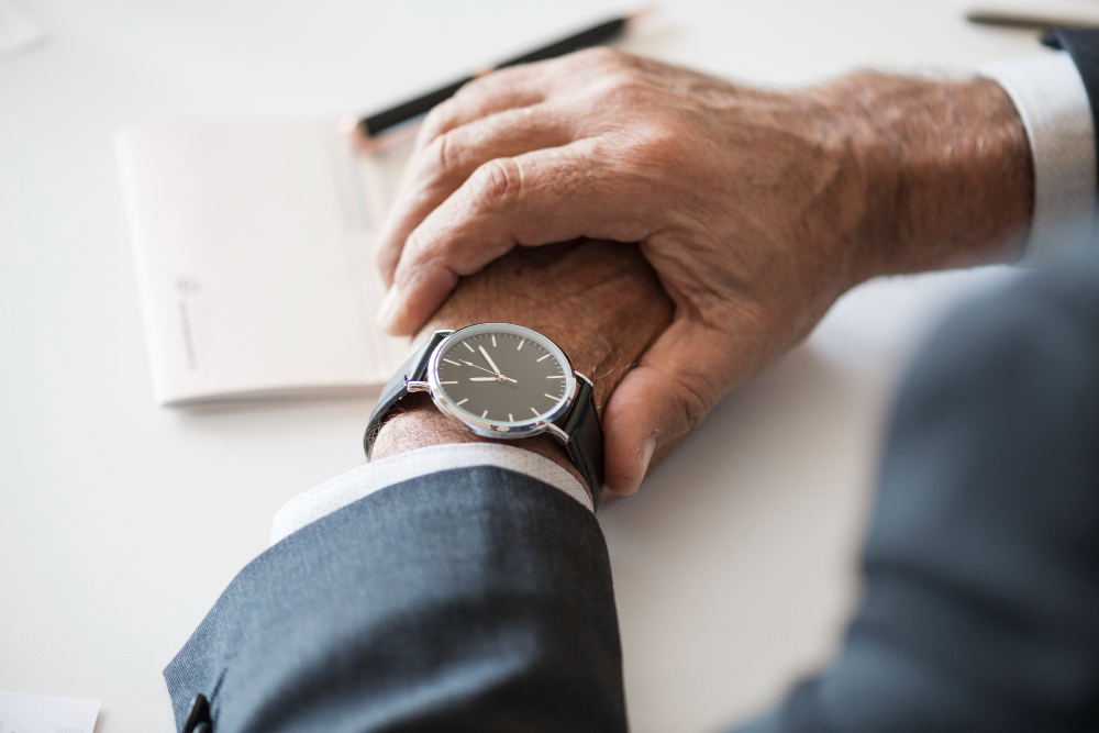 /upl/businessman-checking-time-on-hand-watch.jpg