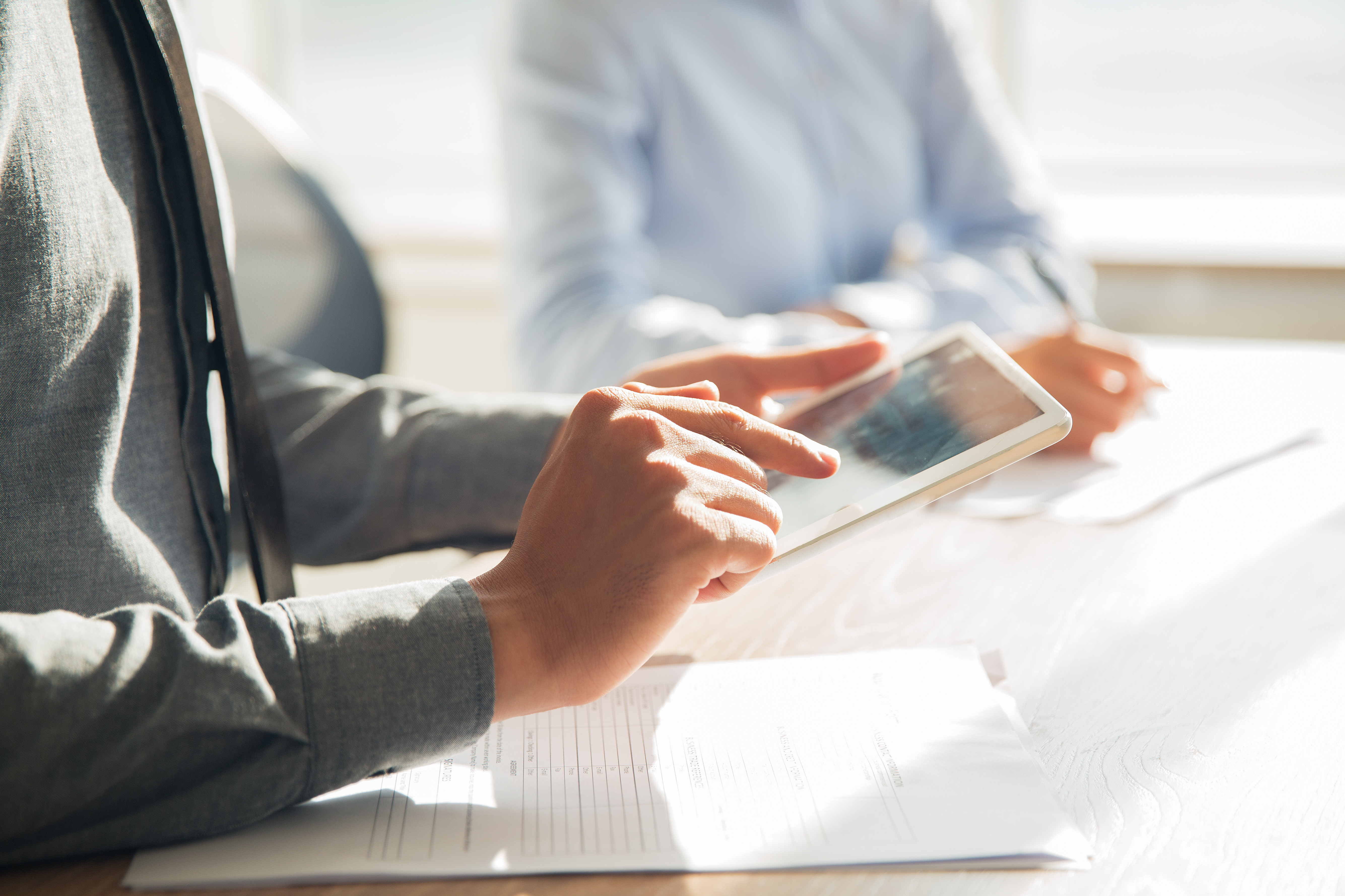 /upl/businessman-working-with-digital-tablet-in-office.jpg