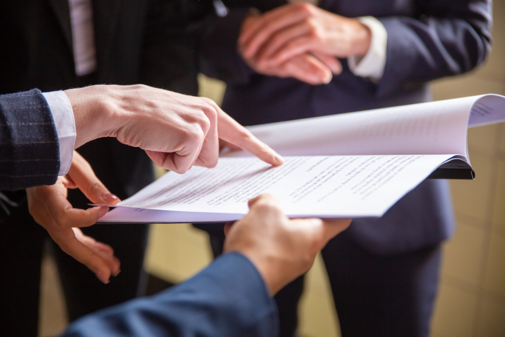 /upl/cropped-view-businesswomen-reading-document.jpg