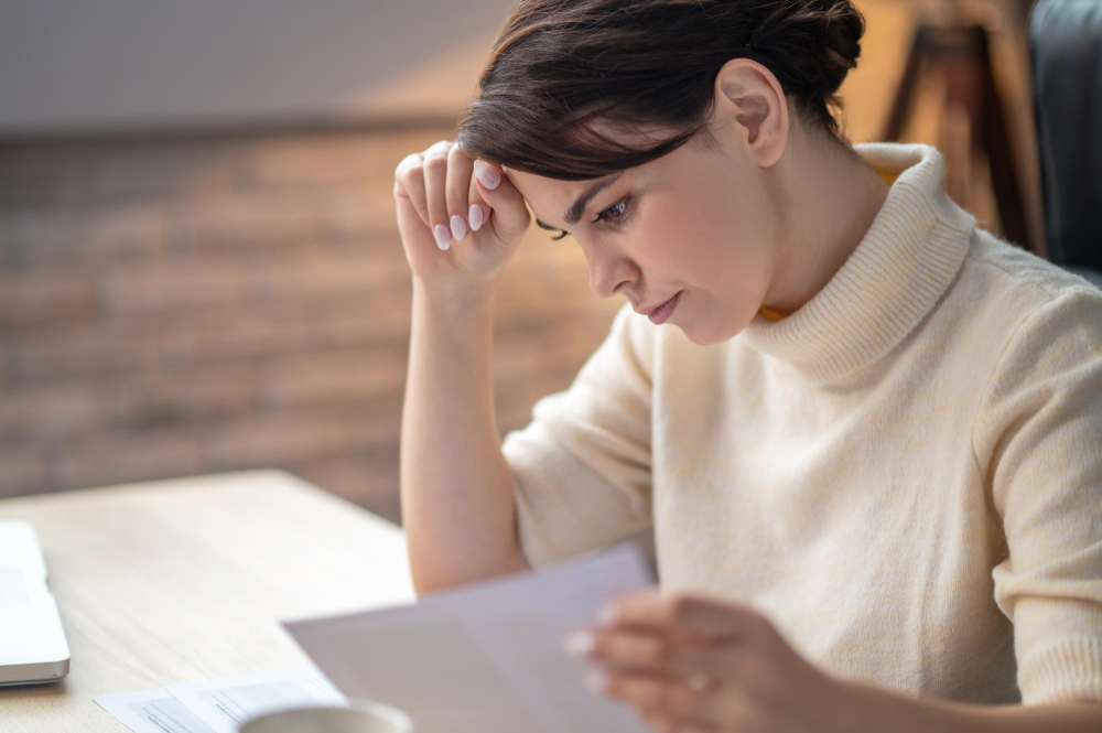 /upl/focused-business-lady-leaning-over-a-contract.jpg