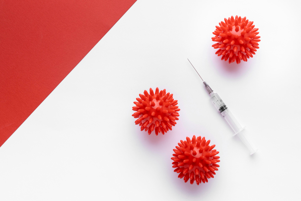 /upl/top-view-viruses-with-syringe-copy-space.jpg
