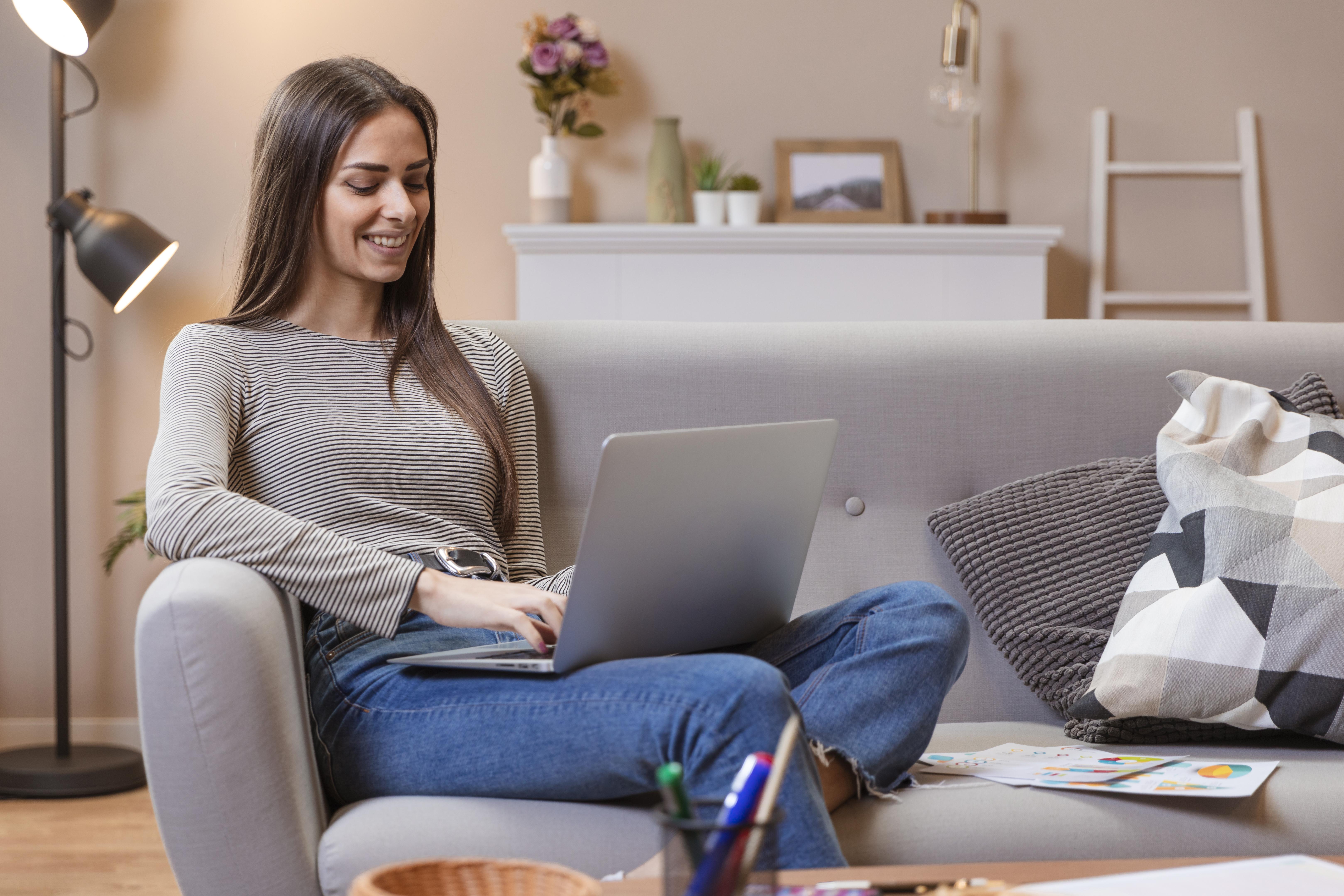 /upl/woman-working-from-a-comfortable-couch.jpg