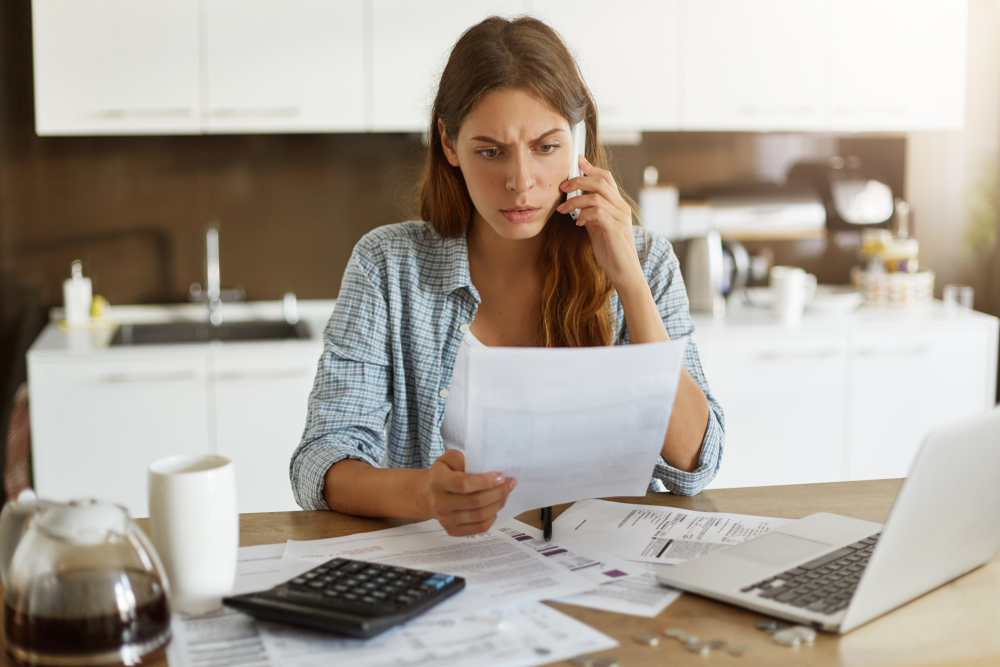 /upl/young-woman-checking-her-budget-and-doing-taxes.jpg
